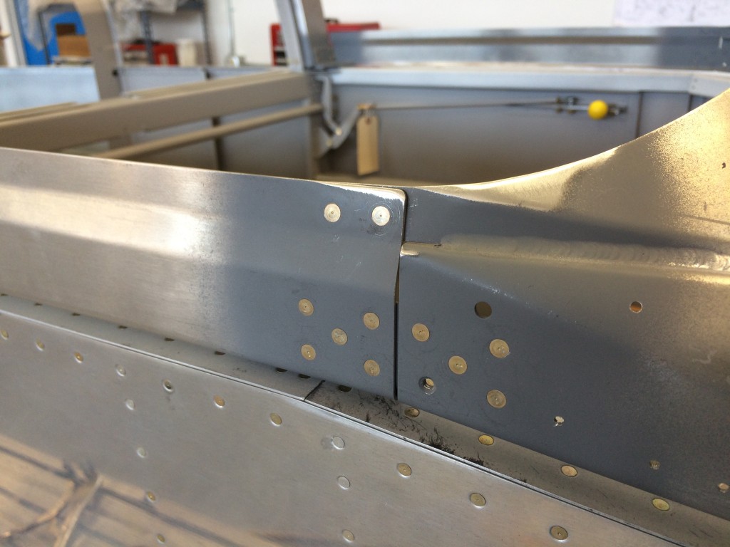 Canopy rail fitted and riveted on the right side