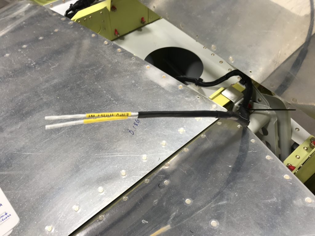 Pitch trim wire over the HS spar